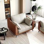 Poltroncina accentuata arancione in similpelle con gambe nere – 1 posto