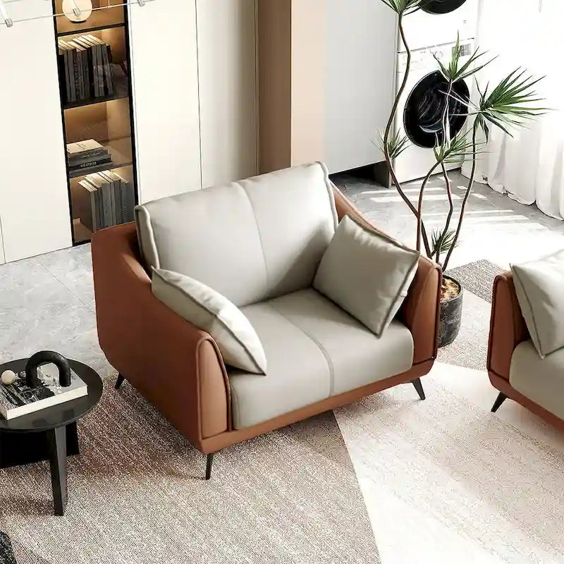 Poltroncina accentuata arancione in similpelle con gambe nere – 1 posto